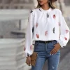 Blusa con Estampado de Pluma de Cuello Alto